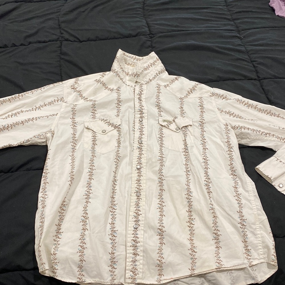 Men’s Button Up Dress Shirt. Has blue flowers and vines.